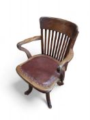 An early-20th-century oak desk chair