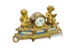 A French ormolu mantel clock, with painted ceramic