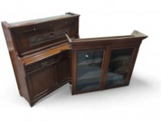 A 20th-century oak bureau-bookshelf