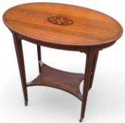 A 19th-century mahogany oval side table with inlay