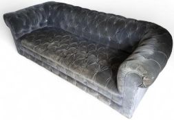 A 20th-century grey velvet sofa