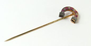 A 19th or early 20th century stick pin, the top in
