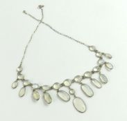 A mid-20th century moonstone fringe necklace, the