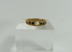 A 15ct gold multi gemstone ring, set with a moonst