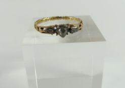 An early Georgian mourning ring, the central rose