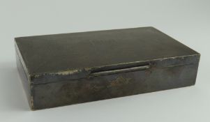 An Art-Deco-style silver cigarette box