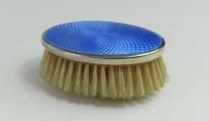 An Art-Deco silver and enamel clothes brush