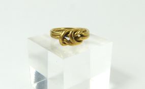 A late Victorian 18ct gold infinity type knot ring