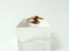 An early 20th century ruby and pearl three stone t