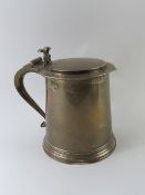 A Charles II-style silver tankard