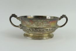 A silver sugar bowl