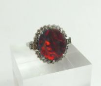 A beautiful Art Deco black opal and diamond ring
