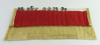Eleven silver coin-bowl spoons