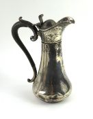 An Edwardian silver hot-water pot