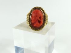 A 19th or possibly 18th century coral ring, the or