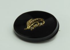 A 19th or early 20th century mourning brooch, the