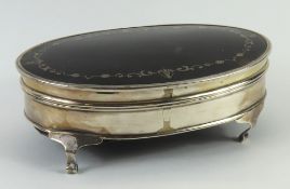 A silver and tortoise-shell box