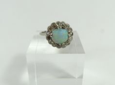 An early to mid-20th century white opal and diamon