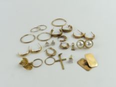 A single cufflink marked '9ct', a 9ct gold cross,