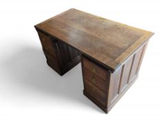 A 19th century oak pedestal desk