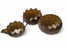 Two decorative bowls alongside a small matching ju