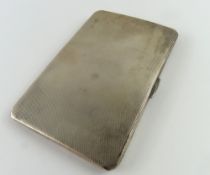 A silver engine turned cigarette case, 12.5cm, 6.4