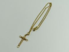 A fancy cross pendant, 4cm long including bale, on