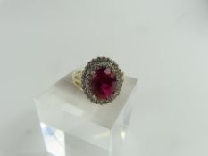 A 9ct gold synthetic ruby and white stone cluster