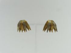 A pair of unusual two colour gold clip earrings, i