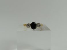 A sapphire and diamond three stone ring, the diamo