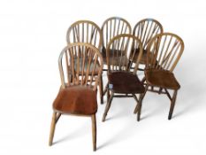 Six oak dining chairs with barred supports, turned