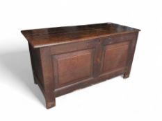 A 19th-century stained-oak coffer