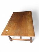 An oak dining table in two parts
