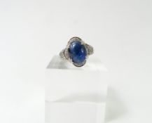 A 9ct white gold sapphire and diamond dress ring,