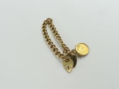 A heavy open curb link bracelet, with two heart pa