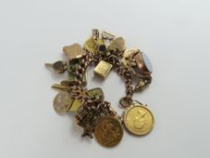 A 9ct rose gold curb link bracelet, most links mar