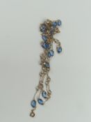 A very long necklace with spectacle set stones, se