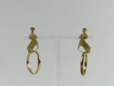 A pair of screw on earrings, in the form of a hand