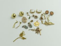 A 9ct gold Leo pendant, a 9ct gold crucifix, a 9ct