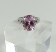 A 9ct white gold kunzite and diamond dress ring, t