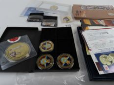 A quantity of gold plated and colour printed comme