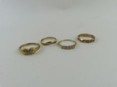Three 9ct gold diamond set rings and a synthetic s
