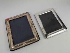 An easel back photograph framed with silver mounts