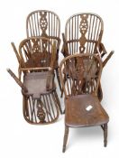 A pair of wheel back Windsor elbow chairs