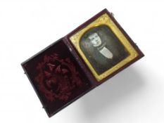 A Victorian Daguerrotype portrait, half length, of