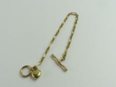 A 9ct gold mixed link bracelet, with a heart charm