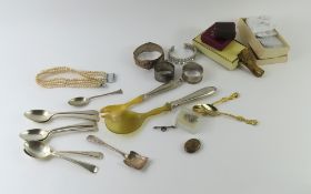 Two silver napkin rings, pair of silver handled an