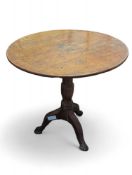 A small round oak table