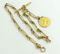 An 18ct gold watch chain, comprised of trombone an