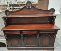 Reproduction Victorian-style mahogany sideboard having single shelf to the top with carved